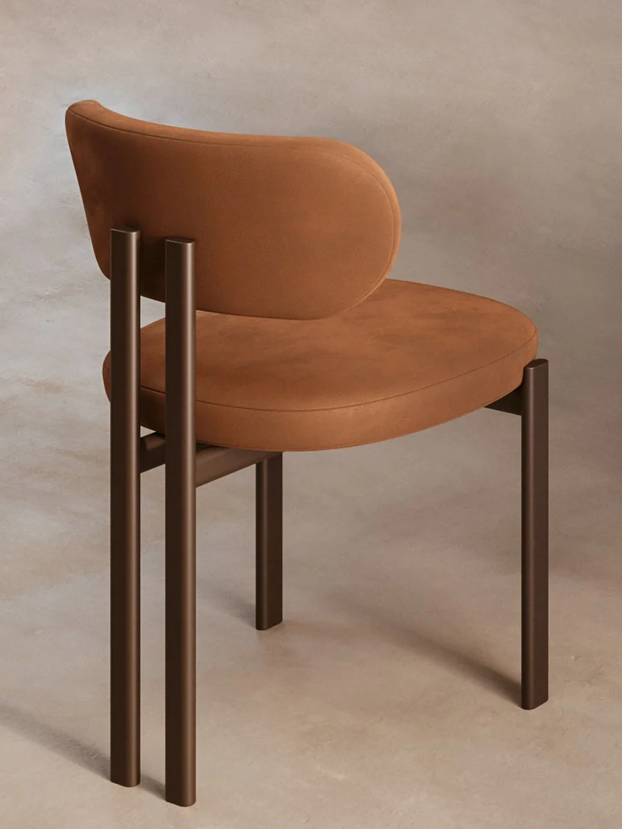CGI packshot of a tan leather dining chair with a dark wood frame