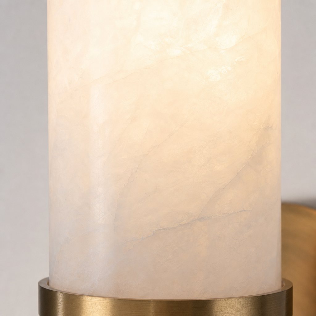 AI lifestyle scene, close detail of the lit alabaster tube and its brass collar
