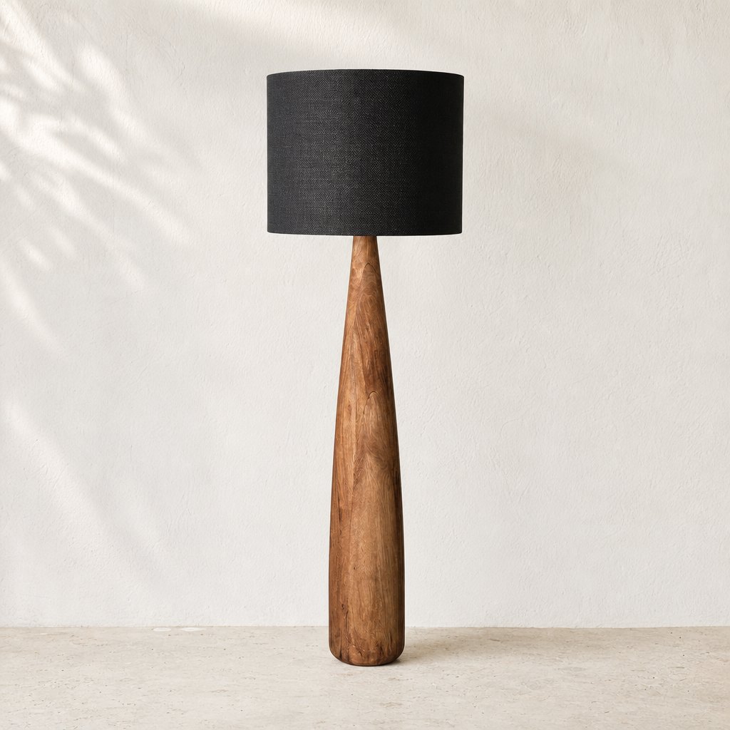 AI lifestyle scene, the Samson floor lamp with a black shade against a plaster wall