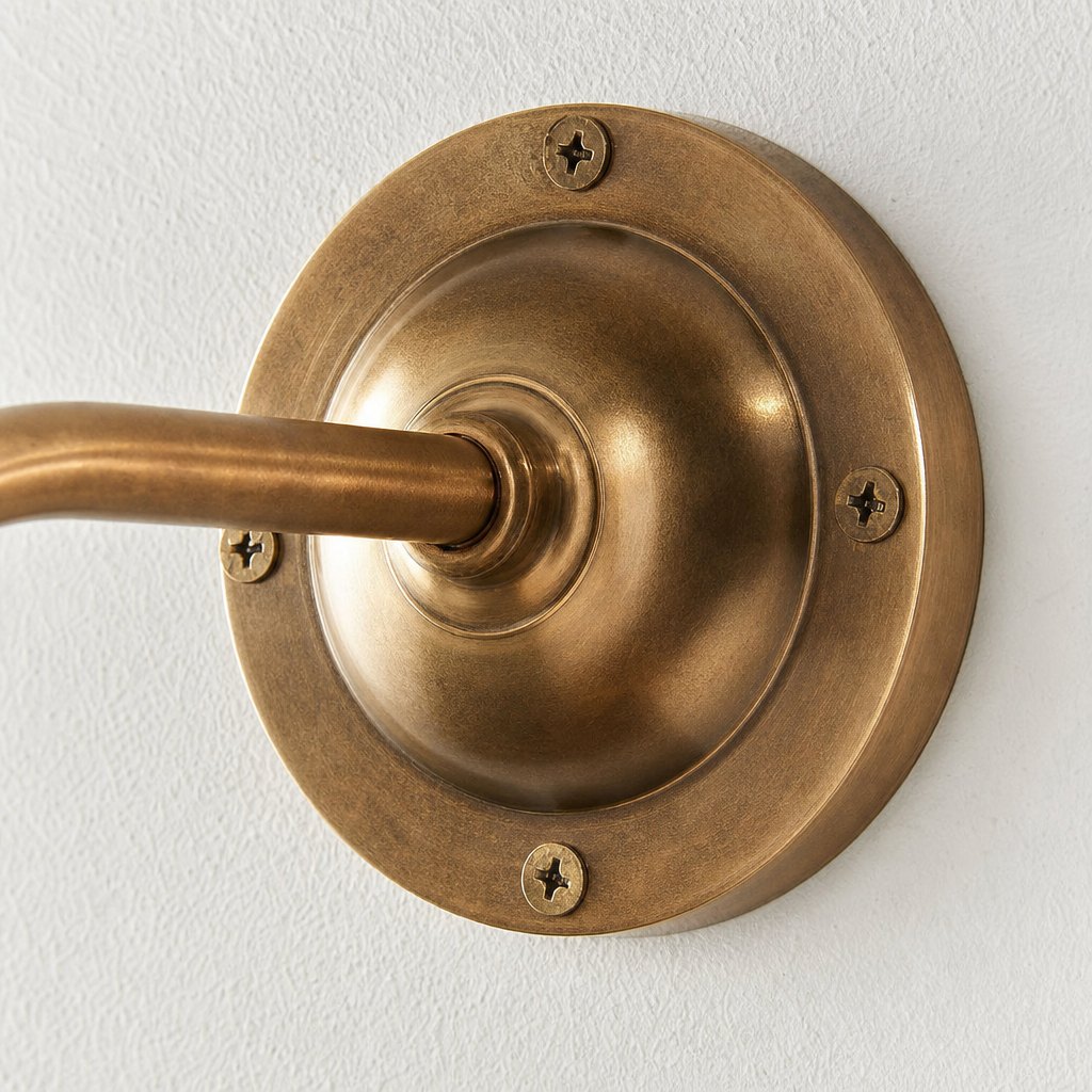 AI lifestyle scene, close detail of the brass wall plate and its screws