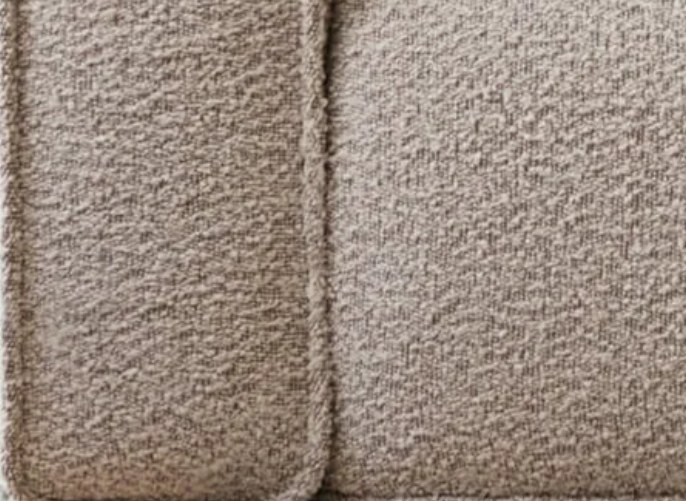 The bouclé upholstery swatch supplied by the brand