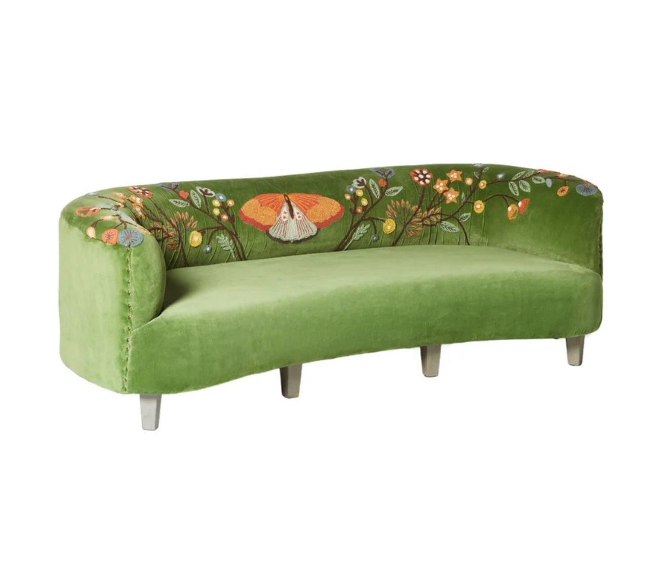 Green velvet sofa with botanical embroidery, the product photo supplied by the brand