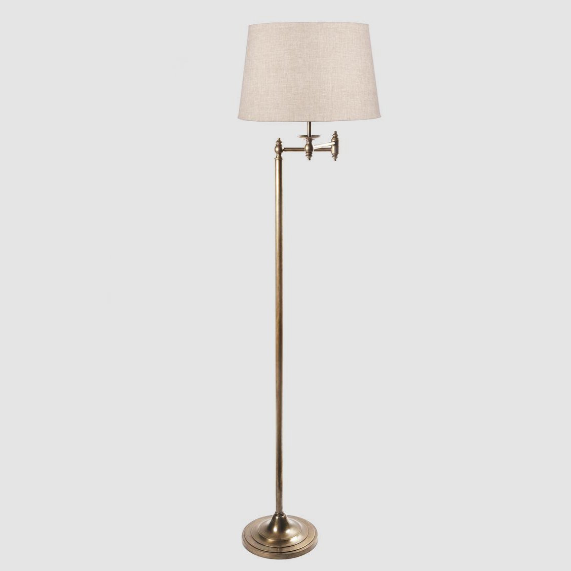 Macleay floor lamp in antique brass, the product photo supplied by the brand
