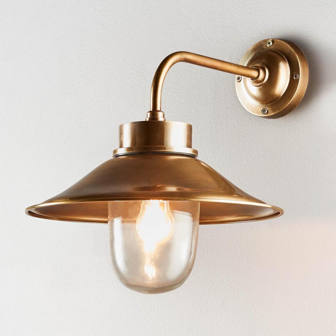 Sandhurst outdoor wall light in antique brass, the product photo supplied by the brand