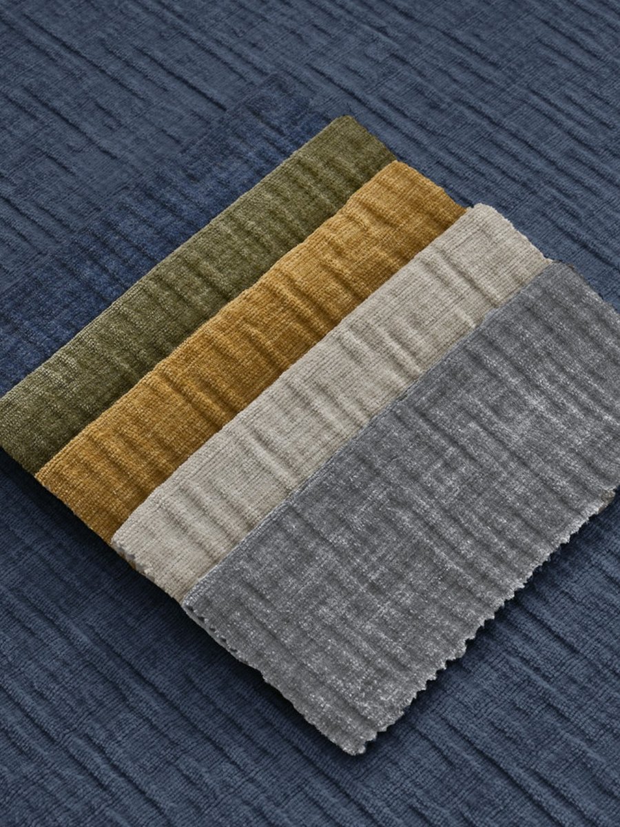 The brand's fabric swatches, four colourways on a woven ground